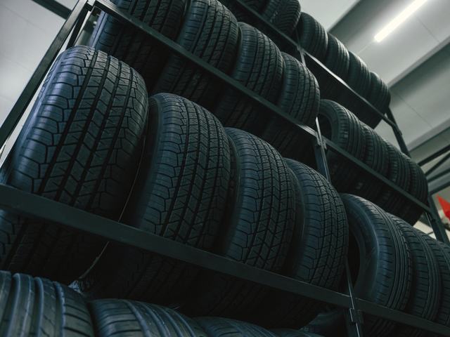 Rows of tyres on metal racking